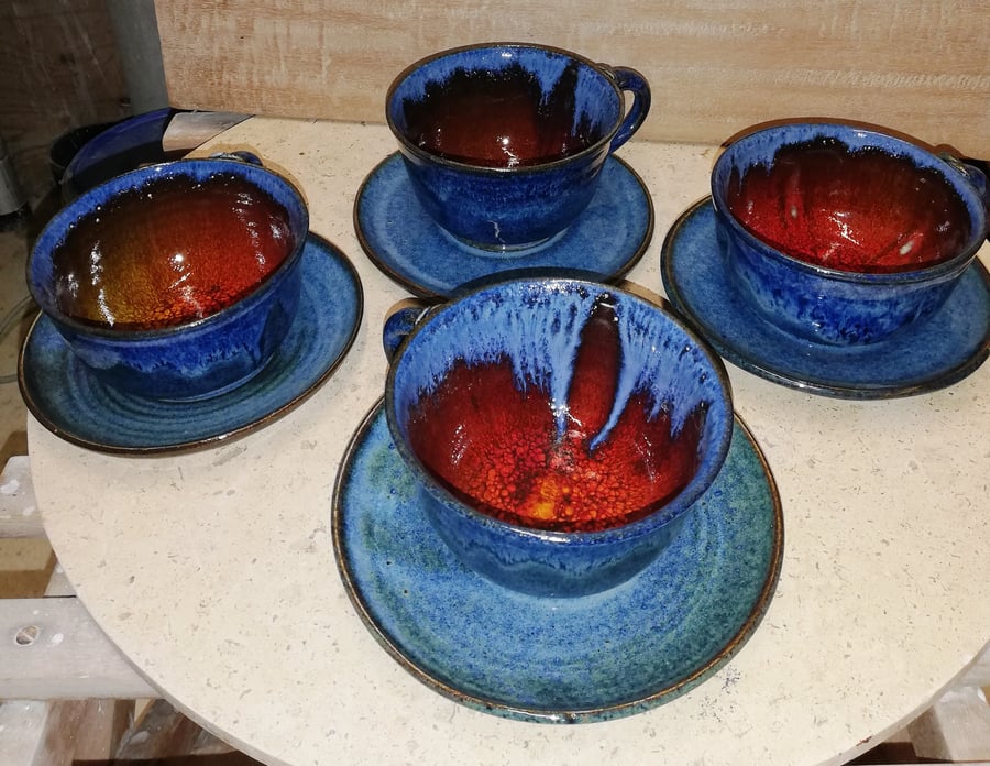 Deliciously coloured blues, red and orange crackle, stoneware cups and saucers