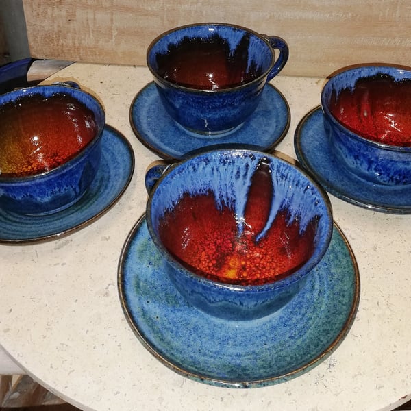Deliciously coloured blues, red and orange crackle, stoneware cups and saucers