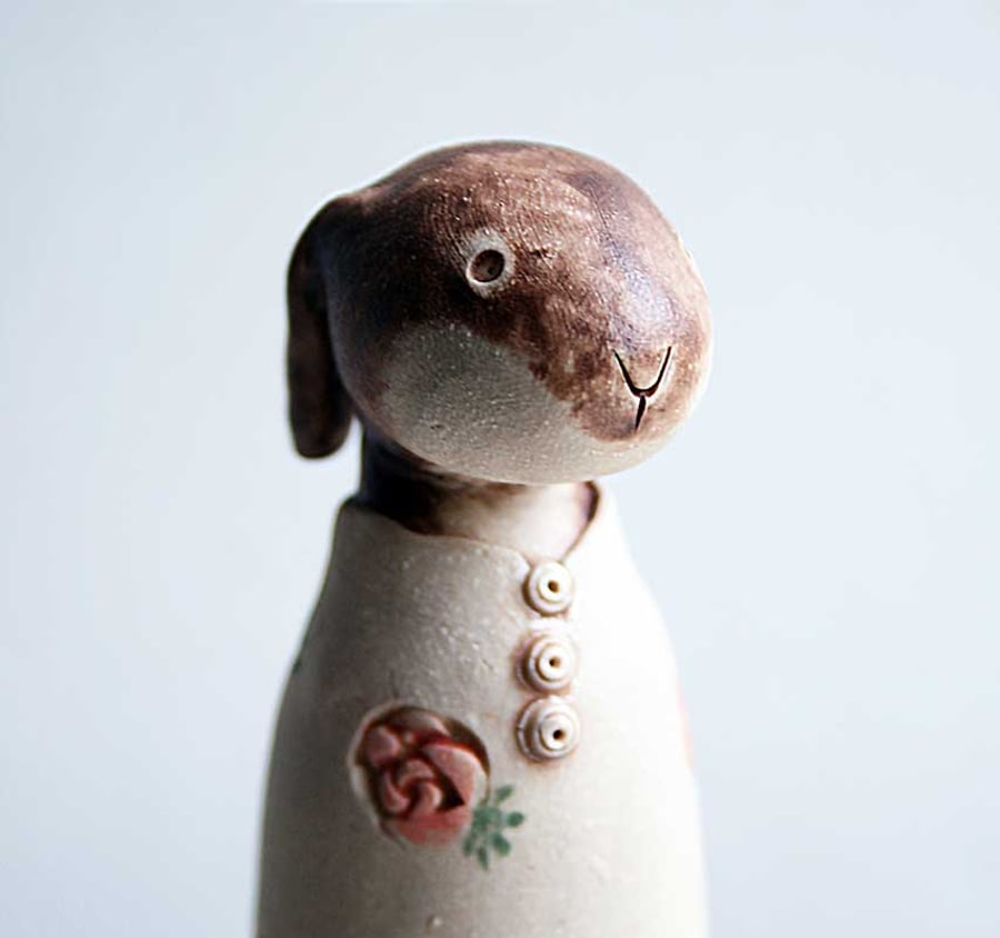 Whimsical rosebud hare sculpture