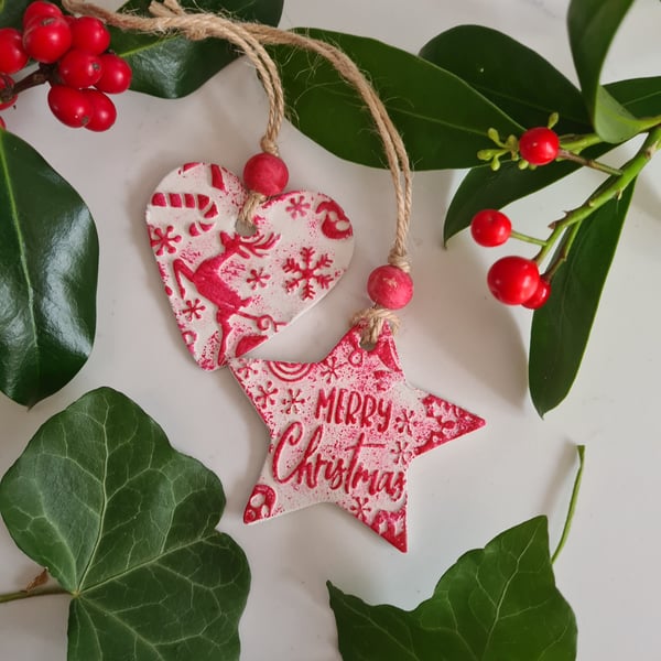 2 clay christmas decorations red star and heart embossed design gift idea