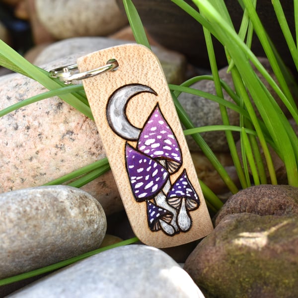 Purple Mushrooms under a Crescent Moon. Pyrography keyring.