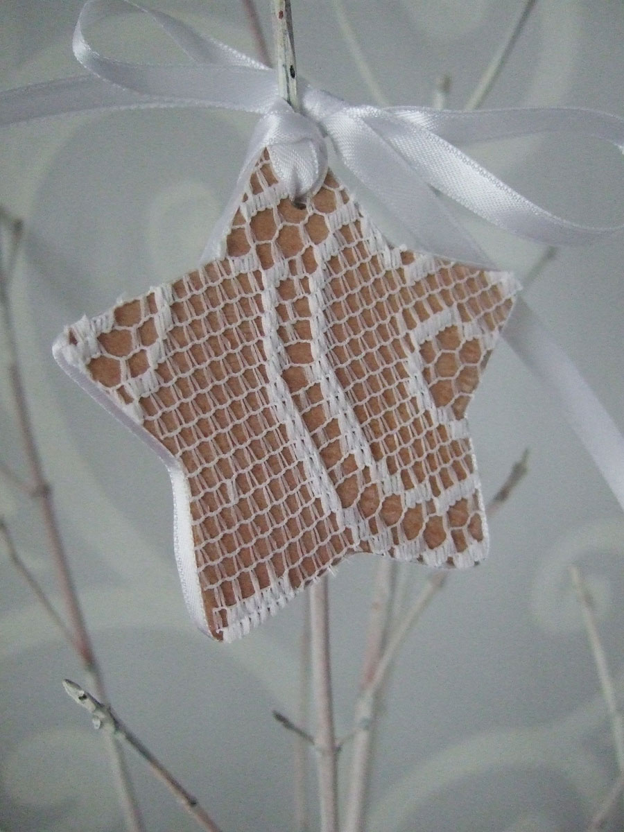 Decoration - snowy white lace on birch wood star