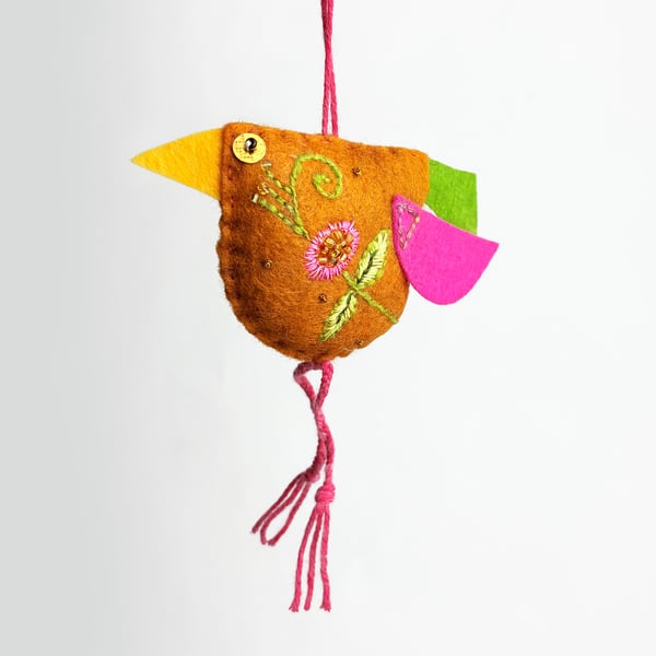   Caramel coloured felt bird with hand embroidered body