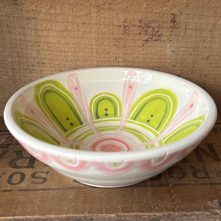Small ceramic dish in shades of pink