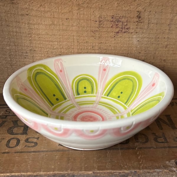 Small ceramic dish in shades of pink