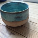 Small turquoise stoneware plant pot or bowl