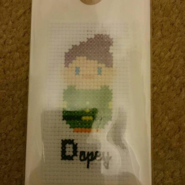 Cute cross stitched dopey gift tag. Have this made to brighten up that special g