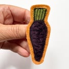 Purple carrot vegetable harvest brooch pin or badge.