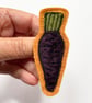 Purple carrot vegetable harvest brooch pin or badge.
