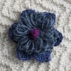 Crocheted silver and blue flower brooch