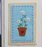 Hand-stitched little white  flowers in a pot with embroidered leaves  - Image 2