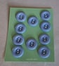 10 ROUND PALE BLUE BUTTONS