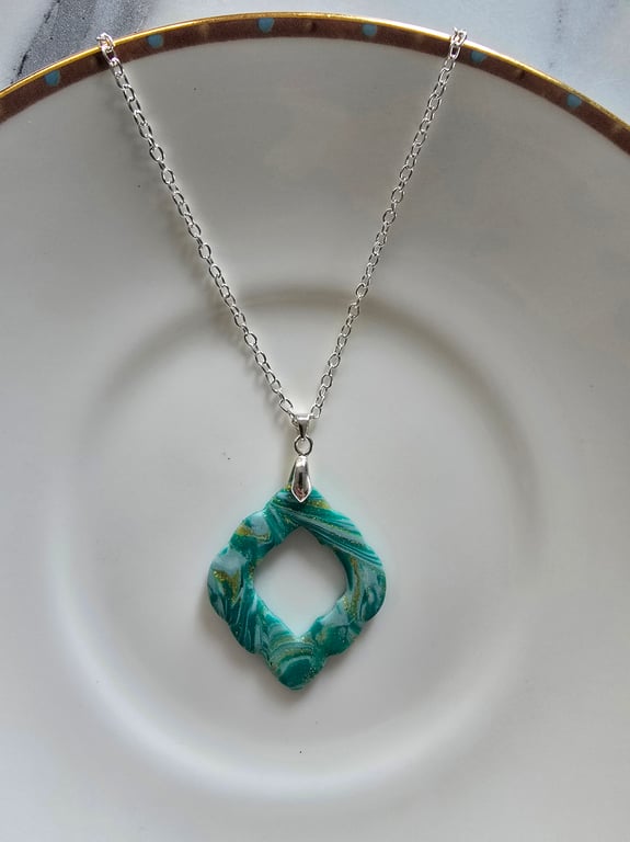 Polymer green and gold necklace on a silver plated chain