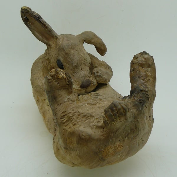 Ceramic Rabbit washing its tummy