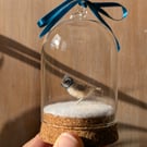 Tiny wool miniature Crested Tit in hanging bell-jar