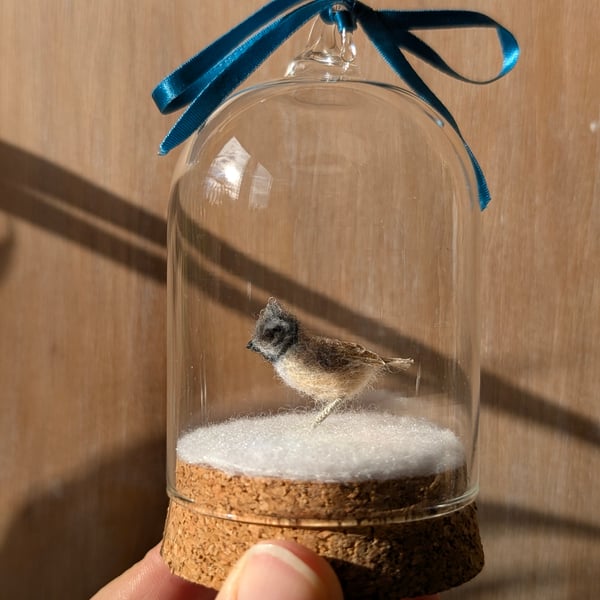 Tiny wool miniature Crested Tit in hanging bell-jar