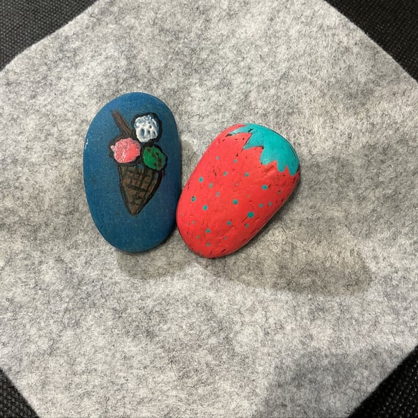 Set of 2 hand painted pebbles with  strawberry and ice cream theme.