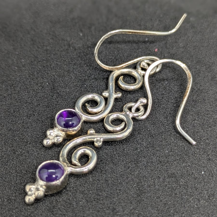 Sterling silver scroll earrings with amethysts