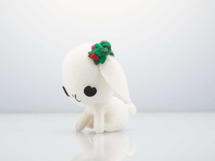 white floppy eared rabbit ornament with roses