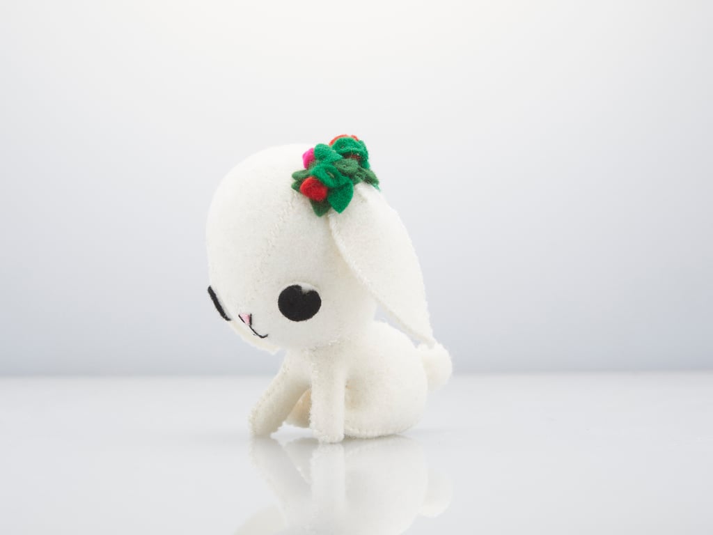 white floppy eared rabbit ornament with roses