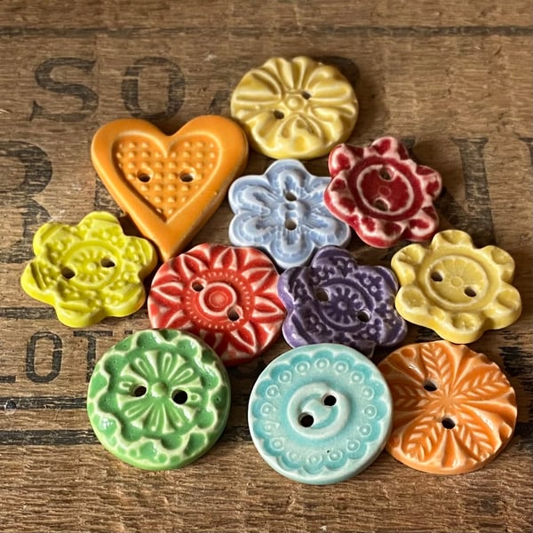 Set of 11 small handmade ceramic buttons orange heart