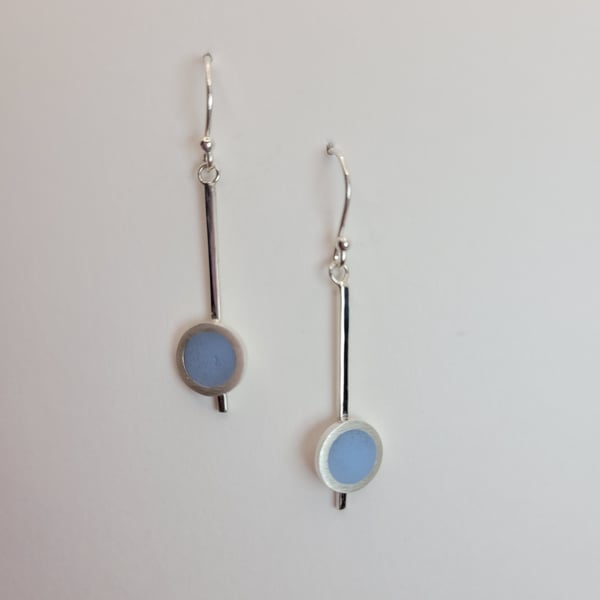 Silver dangley earrings with pale blue circle