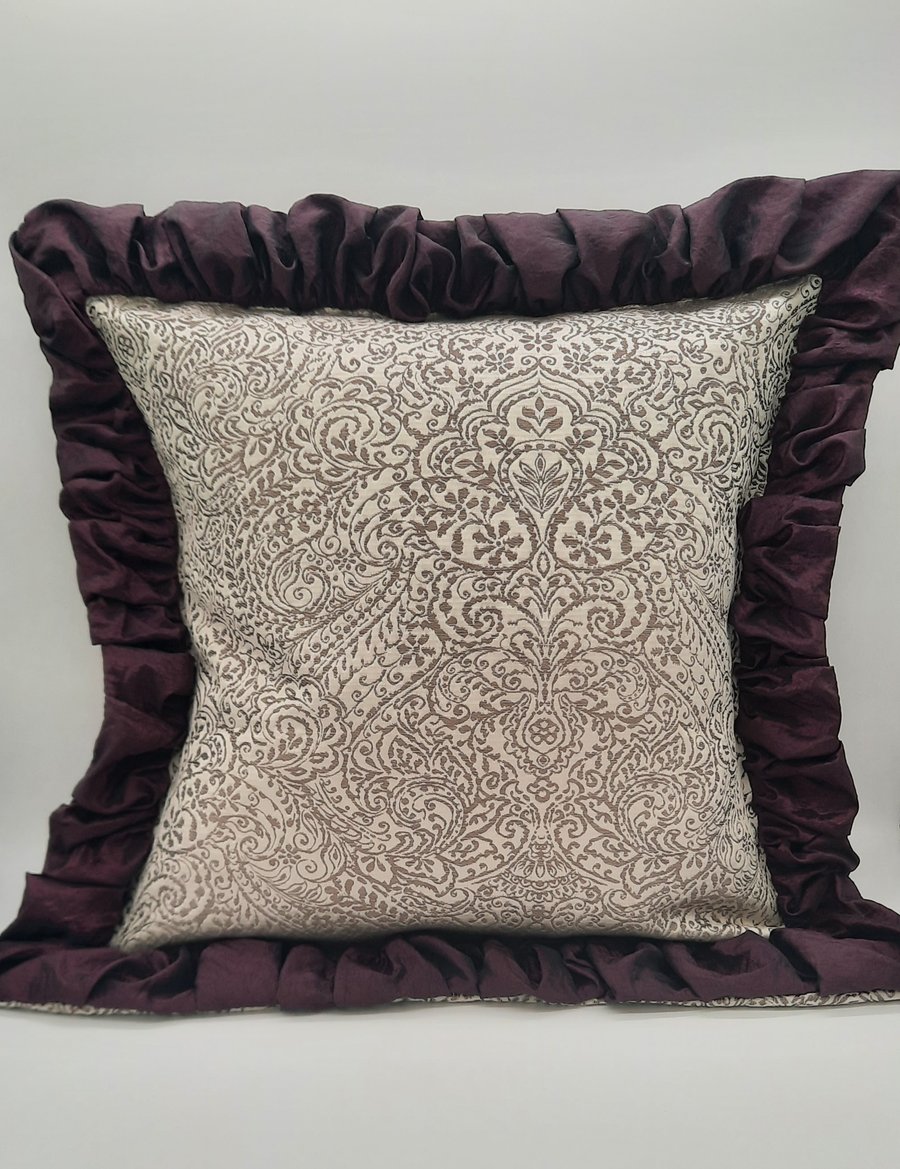 Cushion  - white sand and taupe jacquard with plum edging.  
