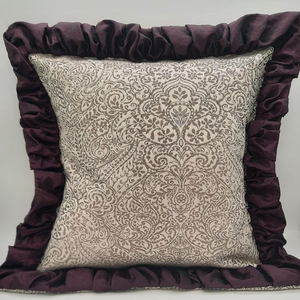 Cushion  - white sand and taupe jacquard with plum edging.  