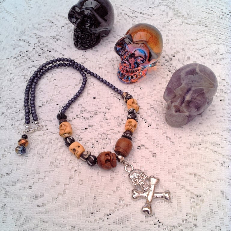 Skull & Crossbones Pendant on a Purple Bead and Skull Bead Necklace, Halloween