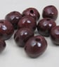 10 Small Dark Copper Glazed Clay Beads - Image 2