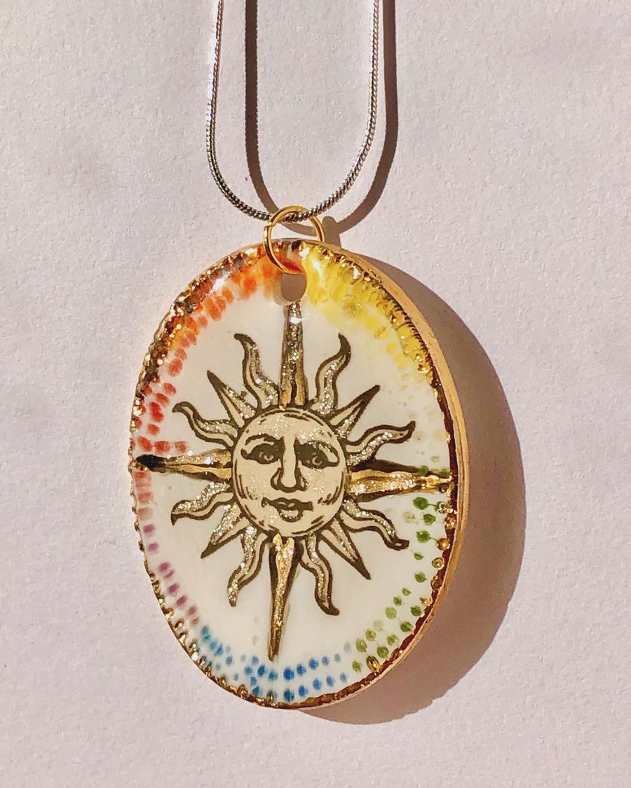 Unique Sun pendant , hand crafted, real gold lustre 