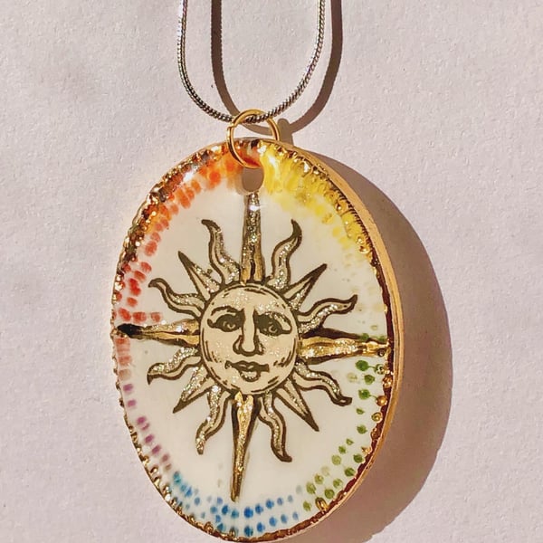 Unique Sun pendant , hand crafted, real gold lustre 