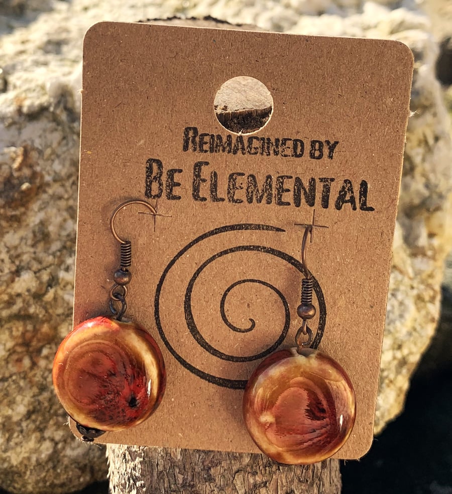 Unusual ceramic caramel glazed earrings with flashes of red
