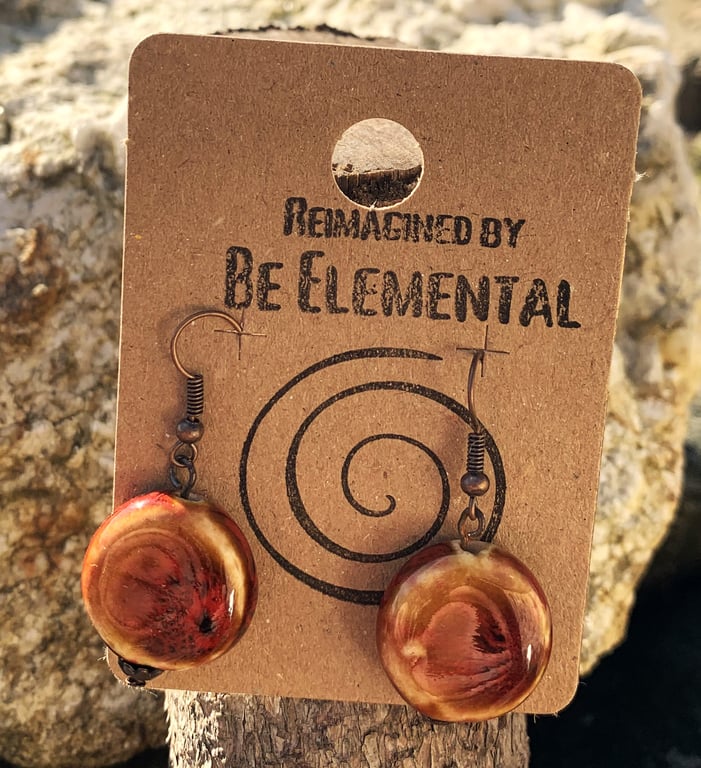 Unusual ceramic caramel glazed earrings with flashes of red