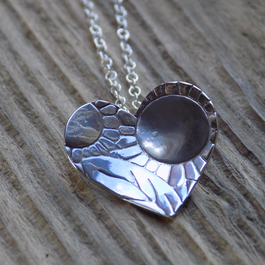 Sterling silver 'floating' patterned heart pendant