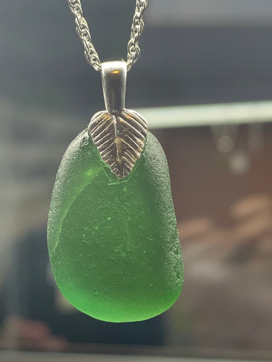 Sterling silver and dark green seaglass pendant