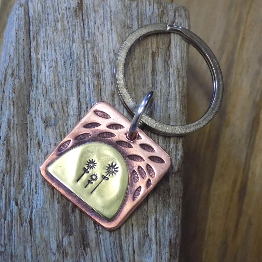 Copper and brass mixed metals flower keyring 