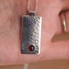 silver pendant, garnet pendant