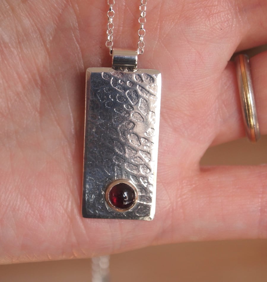 silver pendant, garnet pendant
