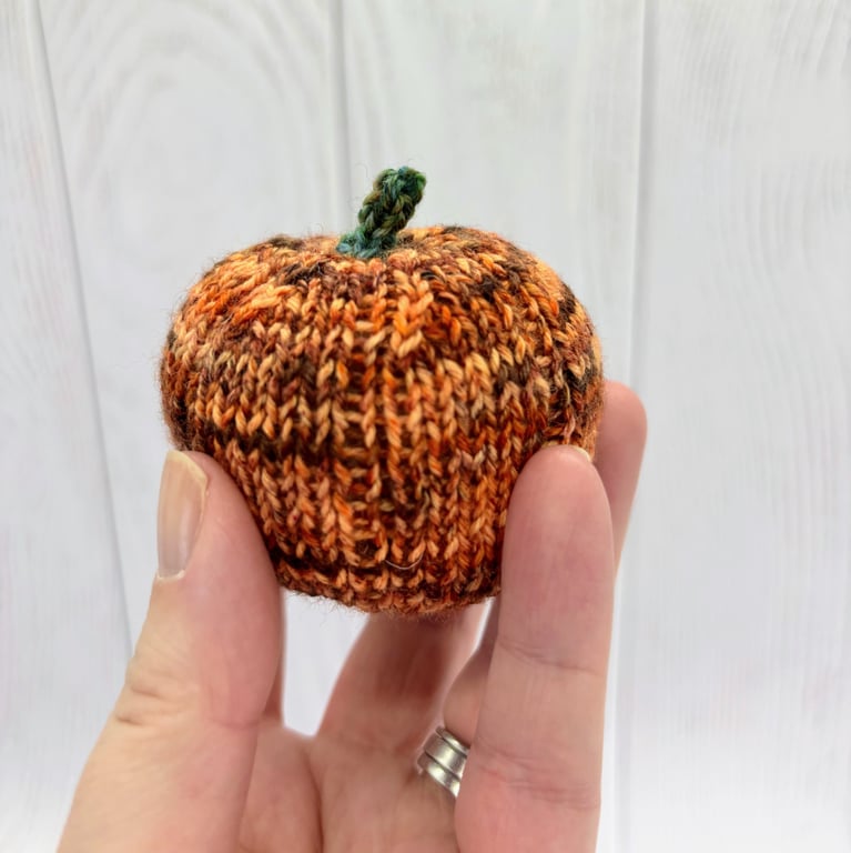 Hand knitted mini pumpkin pin cushion variegated orange