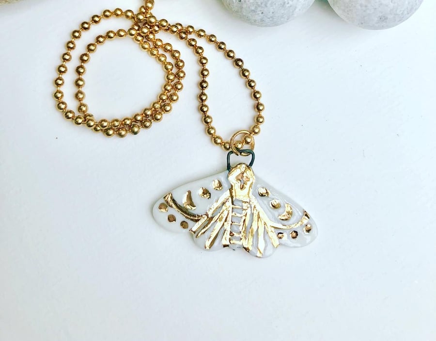 Cute unique vegan porcelain moth pendant with 24 ct gold