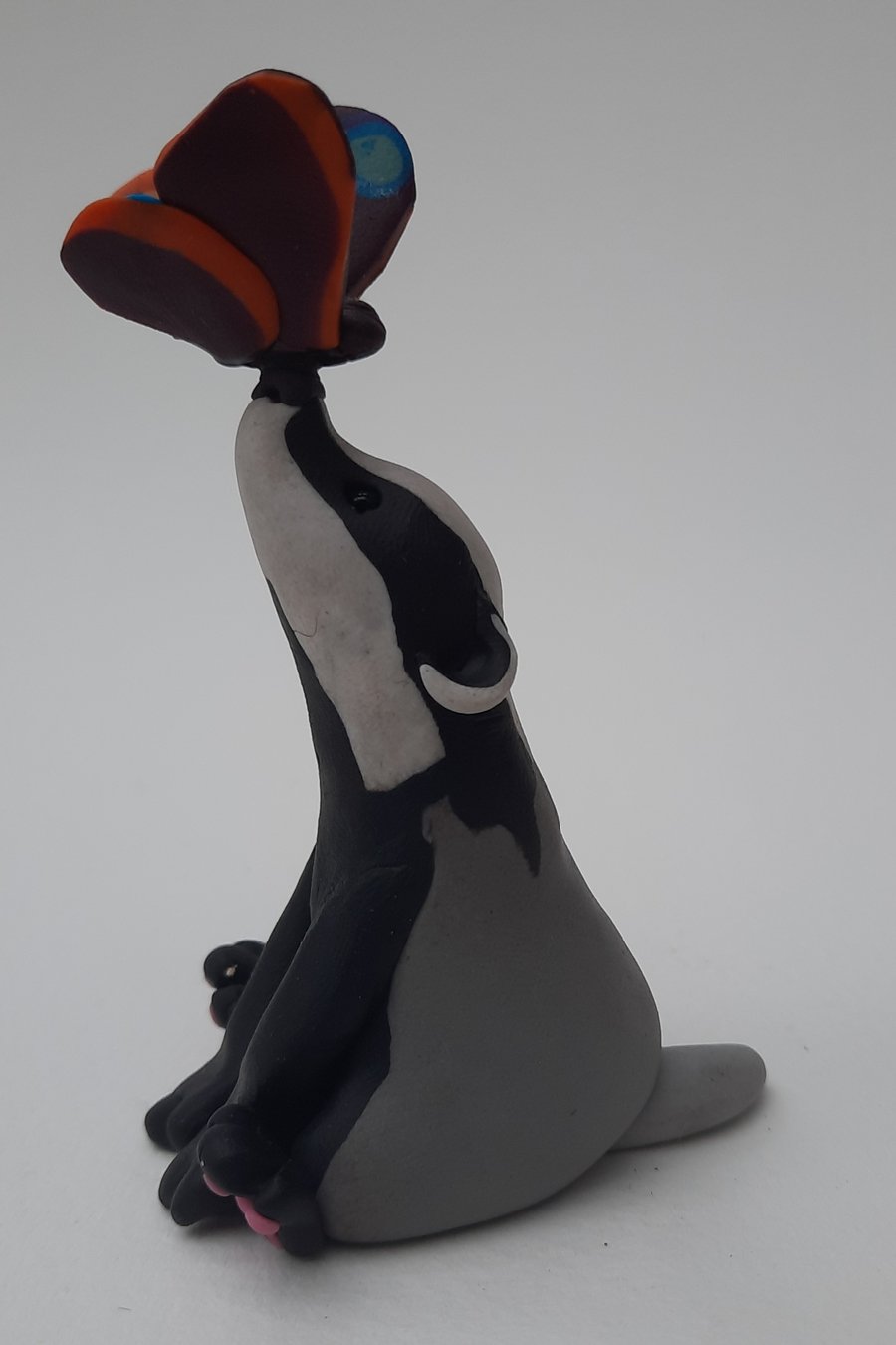 Handmade Polymer clay Badger: AKA Beth and the Butterfly