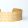 Geometric flower print cuff bracelet mustard