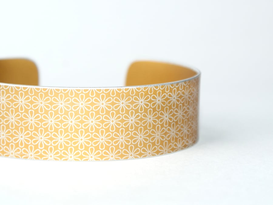 Geometric flower print cuff bracelet mustard