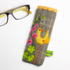 Brown check glasses case with bird and hollyhock embroidery