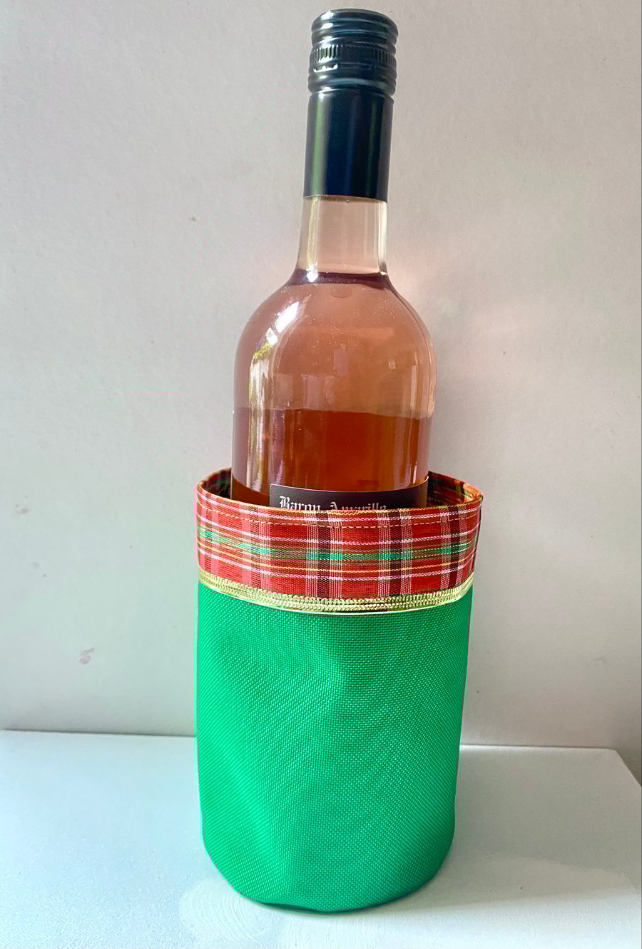 Tartan trim Christmas bottle or pot holder
