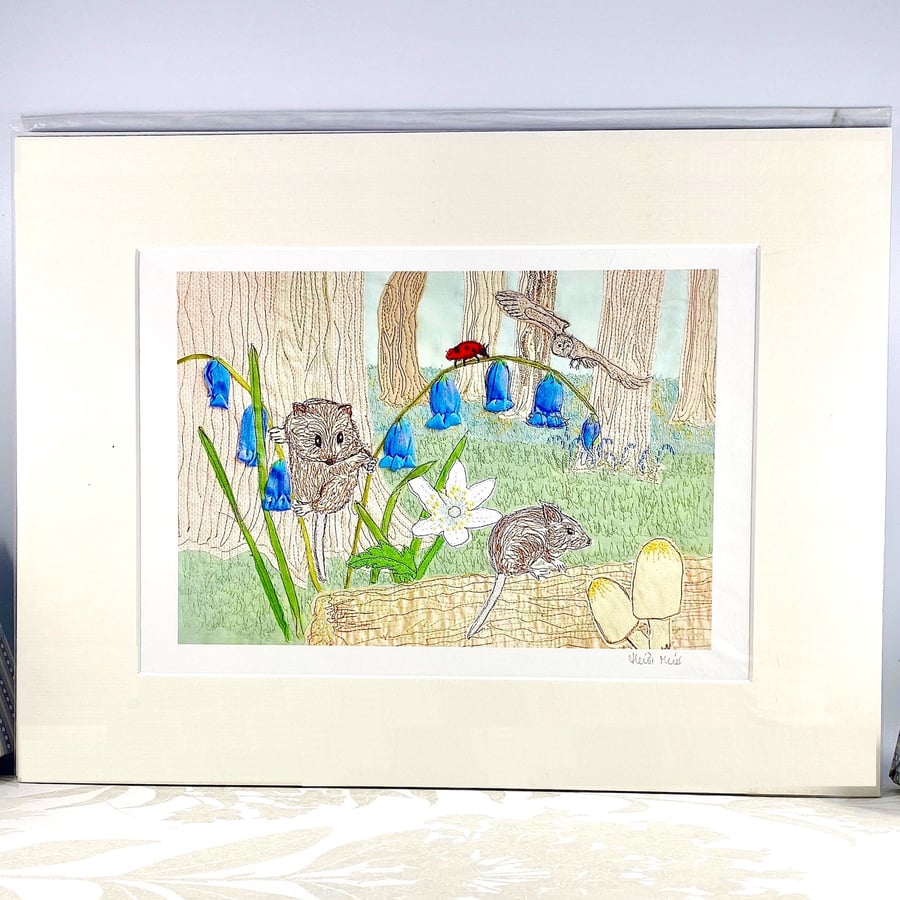 Woodland mouse and bluebells