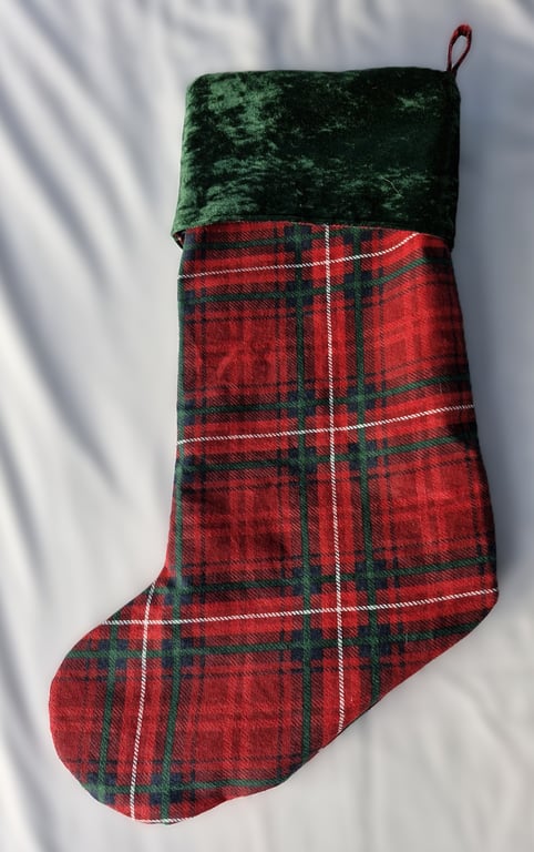 Tartan stocking with green velour cuff, tartan lining and hanging loop.