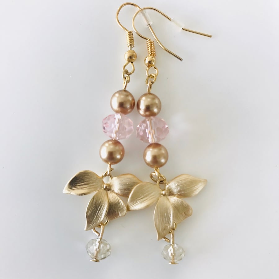 Pink glass and golden flower dangle earrings , boho earrings.