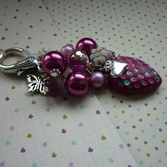 SHADES OF PINK AND SILVER HANDBAG CHARM.